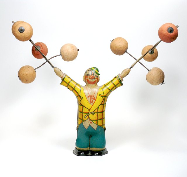 ...wie der jonglierende Clown.