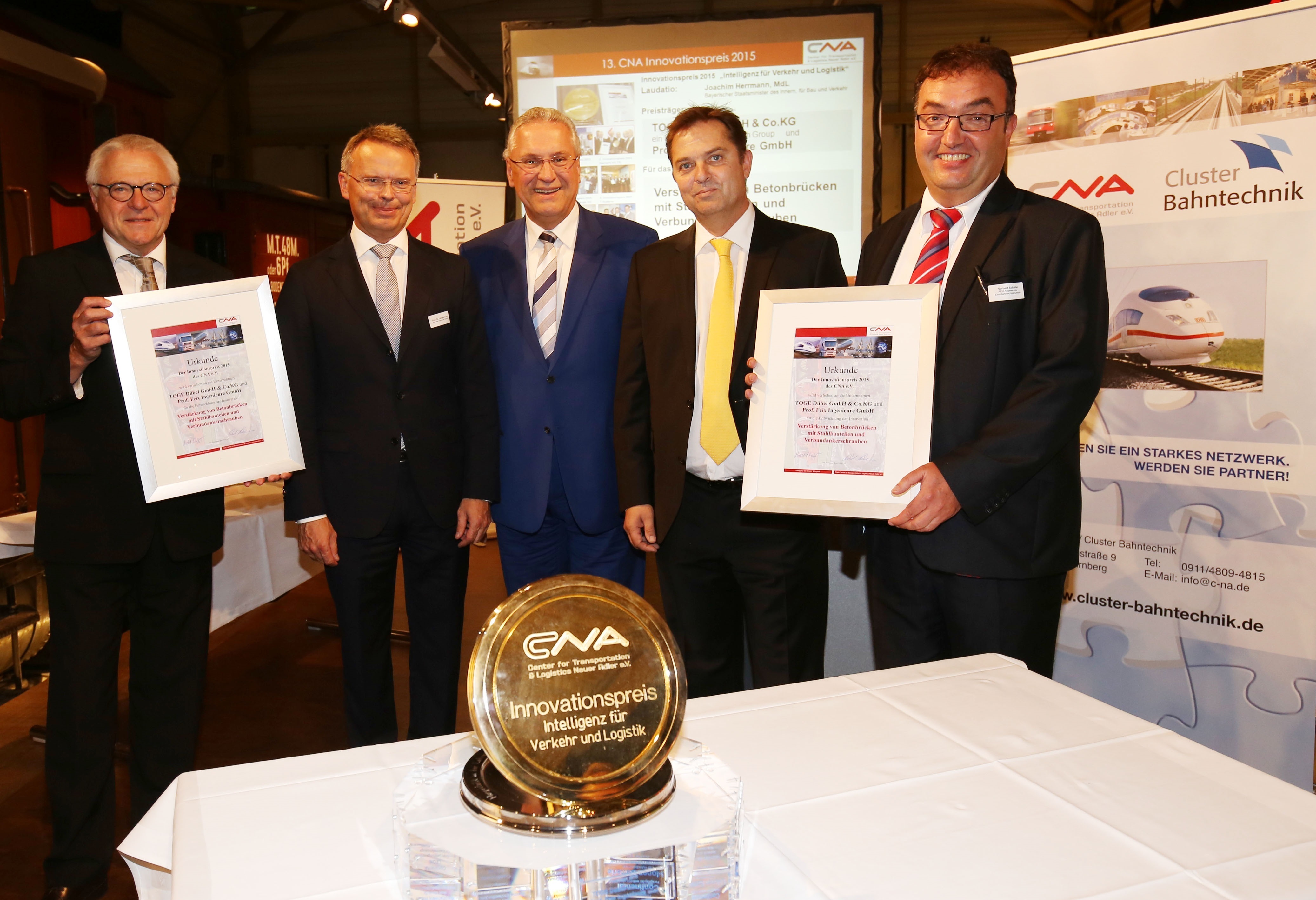 Karl-Hermann Klausecker, Clustersprecher Bahntechnik; Prof. Dr. Jürgen Feix, Geschäftsführender Gesellschafter Prof. Feix Ingenieure, Staatsminister Joachim Herrmann, Andreas Gerhard, Geschäftsführer TOGE Dübel und Norbert Schäfer (v.l.), Vorstandsvorsitzender CNA.