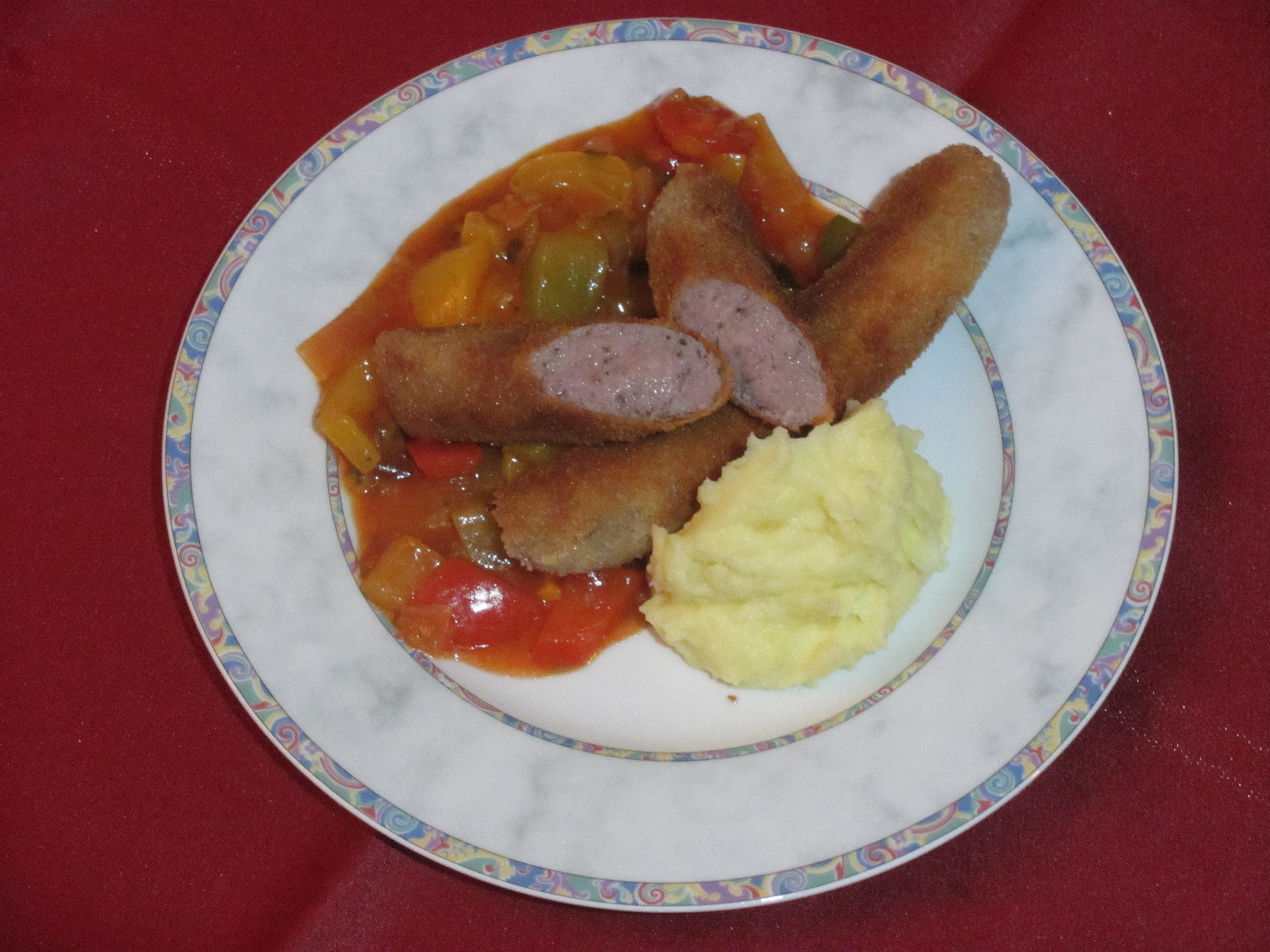 banierte Bratwörscht mit Äbienbrei und Gmüs aus Dormitz