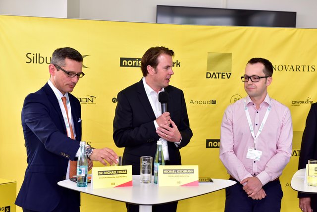 Gastgeber der Pressekonferenz: Michael Oschmann (Mitte, CEO Sellwerk, Müller Medien) begrüßt die Medien. Foto: © P. Maskow