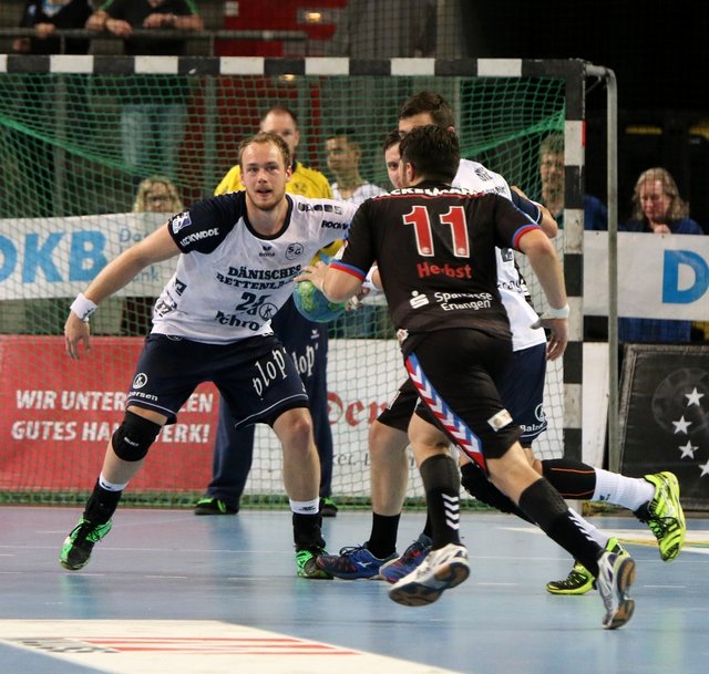 (Foto: HJKrieg, hl-studios, Erlangen): Flensburg wusste, dass es mit dem HC Erlangen (hier mit Kevin Herbst) in der Arena Nürnberger Versicherung schwer wird
