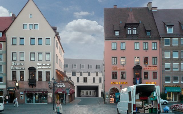 So präsentiert sich der Neubau (Bildmitte) vom Hauptmarkt aus gesehen. Visualisierung: © Staab Architekten