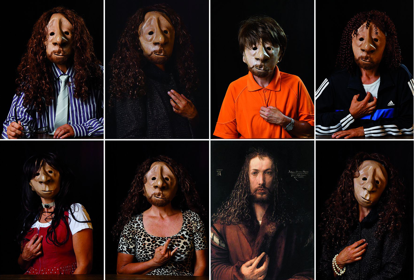 Gäste des Nürnberger Herbstvolksfests 2018 präsentieren sich mit Dürer-Masken.