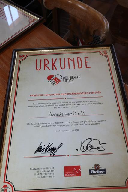 Urkunde für den Sternchenmarkt e.V. | Foto: John R. Braun