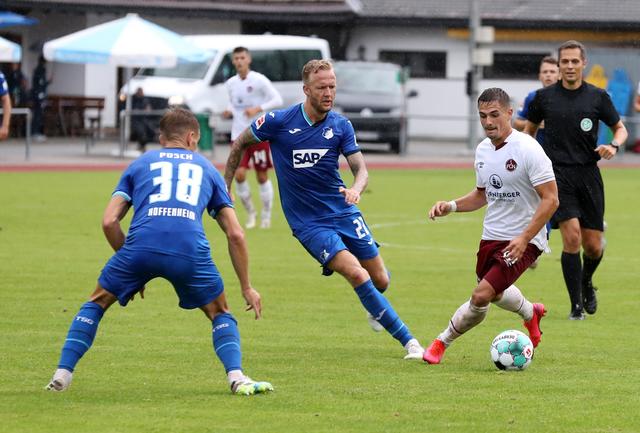Stefan Posch (38, TSG 1899 Hoffenheim),  Kevin Vogt (22, TSG 1899 Hoffenheim), Nikola Dovedan (10, 1. FCN).  | Foto: 1. FC Nürnberg/Daniel Marr
