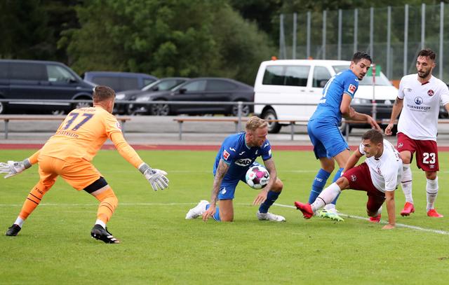 Luca Philipp (37, TSG 1899 Hoffenheim), Kevin Vogt (22, TSG 1899 Hoffenheim), Nikola Dovedan (10, 1. FCN).  | Foto: 1. FC Nürnberg/Daniel Marr