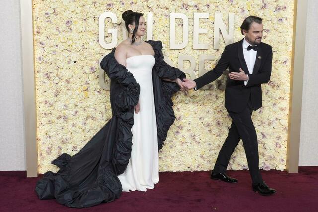 Lily Gladstone und Leonardo DiCaprio kommen zur Verleihung der Golden Globes. Foto: Jordan Strauss/Invision/AP/dpa
