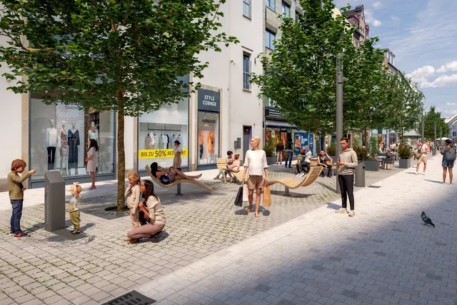 Verlegt wird ein neuer Belag aus Granitpflaster, wie er bereits am angrenzenden Ludwigsplatz verwendet wurde. In der Mitte der Gasse entstehen neun neue Baumstandorte, eingefasst von einem wasserdurchlässigen „Klimaband“ aus erstmals in Nürnberg verwendeten wasserspeichernden Steinen. | Foto: Visualisierung/Alexander Tschopoff / Alexander Tschopoff / Stadt Nürnberg