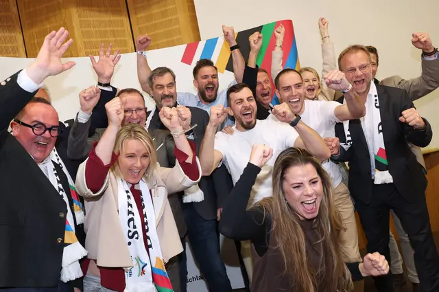 Die Befürworter bejubeln das Ja der Münchner Bürger für eine Olympia-Bewerbung. | Foto: Karl-Josef Hildenbrand/dpa